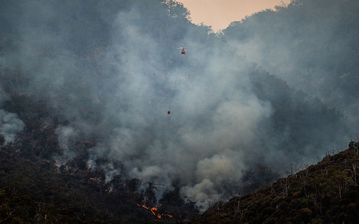Helicopter over bushfire