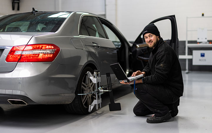 Person working on car