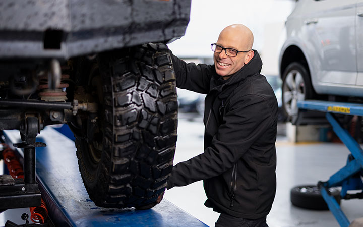 Person working on car