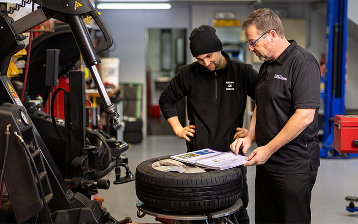 Two people in workshop