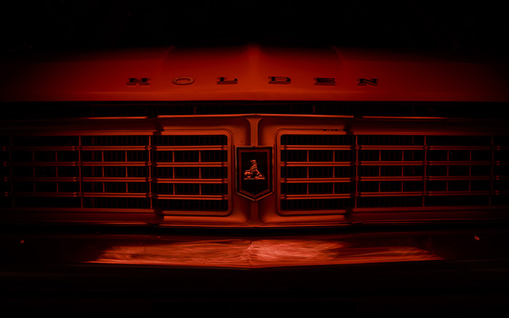 Close-up of a Holden car showcasing its logo prominently on the front.