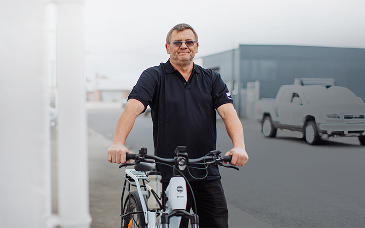 Roy Turner standing next to his new e-bike.