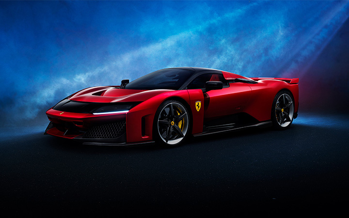 A sleek Ferrari F80 supercar displayed prominently, showcasing its aerodynamic design and vibrant red color.