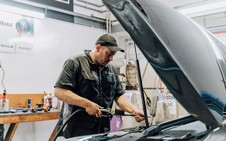 Man working on car