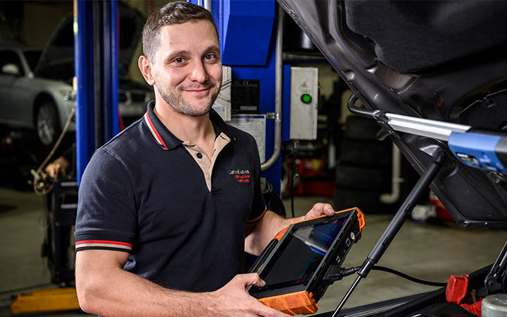 Man using diagnostic tool