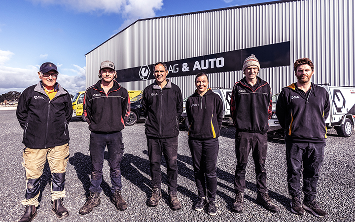 The All Ag & Auto team standing in front of their warehouse