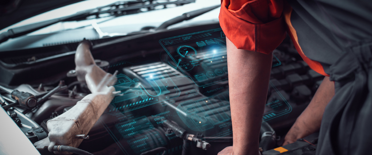 Technician using AI‑powered diagnostics on a vehicle with the bonnet up, digital data overlay guiding fault‑finding in an aftermarket workshop.