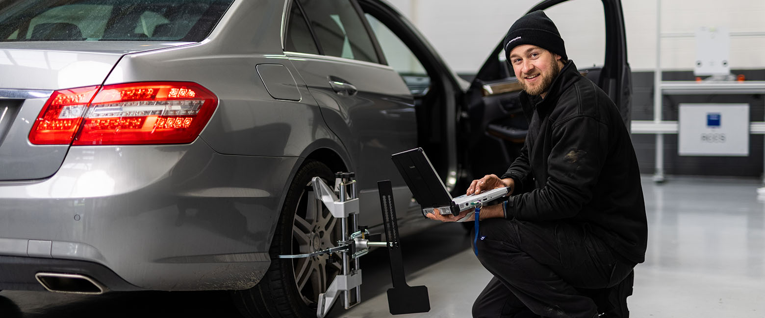 Person working on car