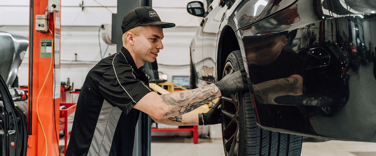 Person working on car