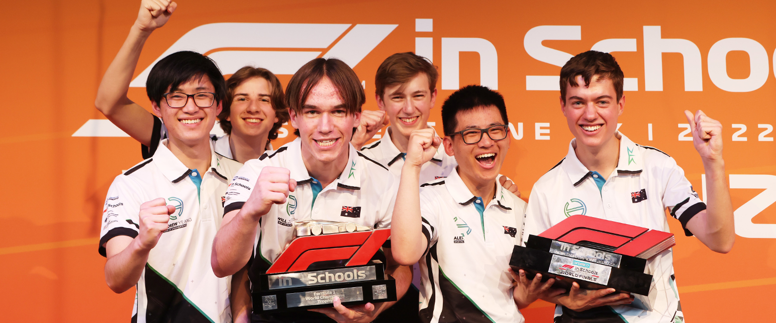 Hydron team holding the trophy and celebrate to the camera