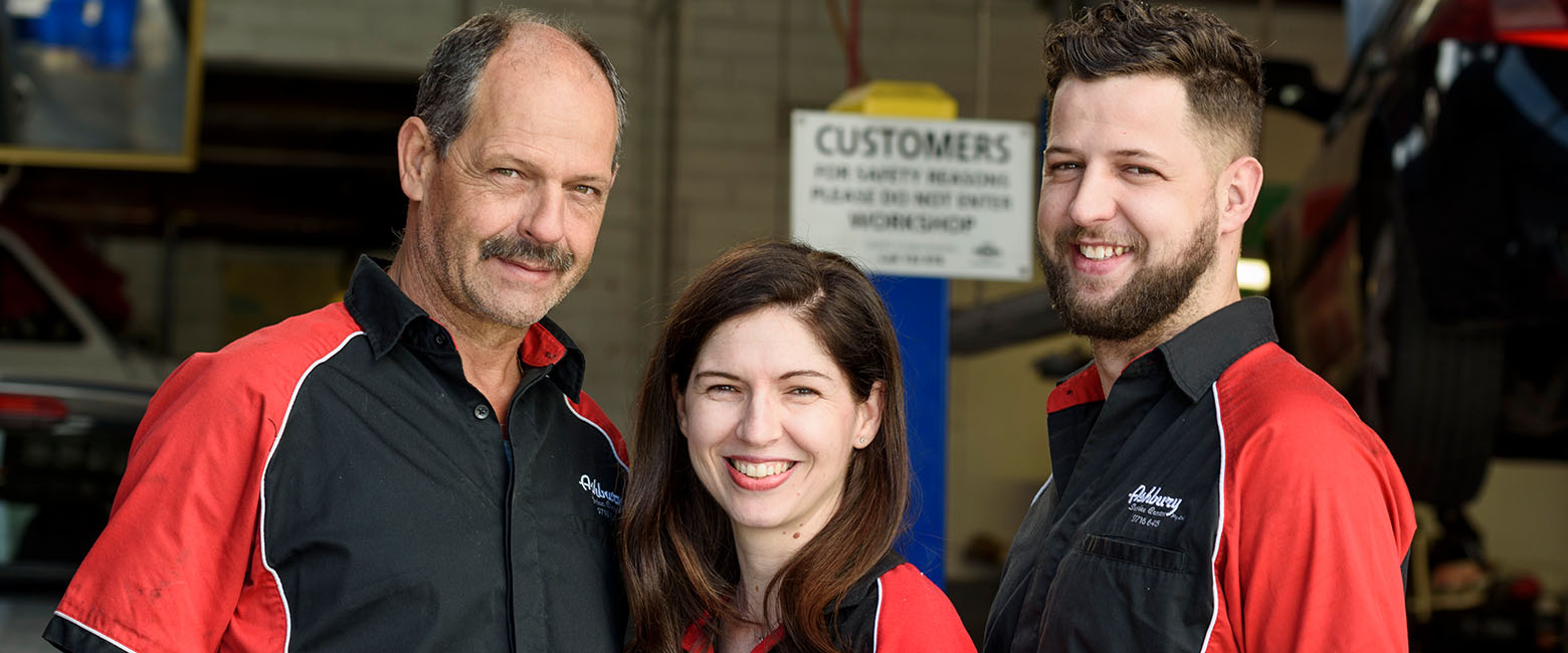 People in front of business