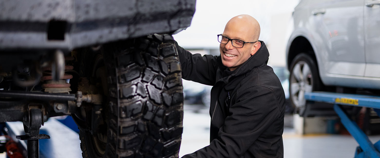 Person working on car