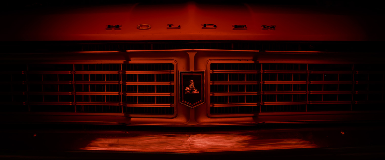 Close-up of a Holden car showcasing its logo prominently on the front.