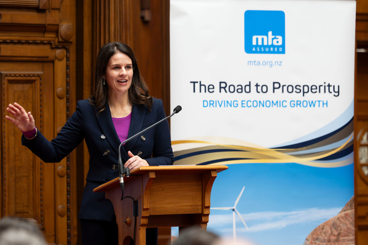 Erica Stanford giving a speech at an MTA event