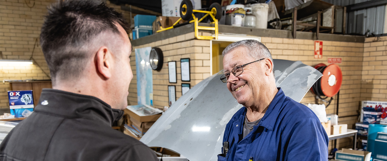 Capricorn Member talking and smiling with a Capricorn Area Manager