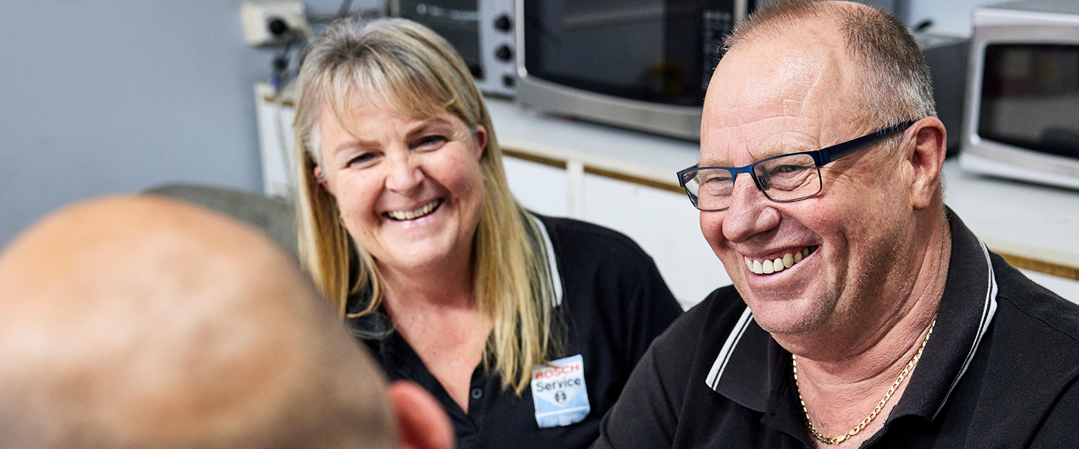 Capricorn Members talking and smiling