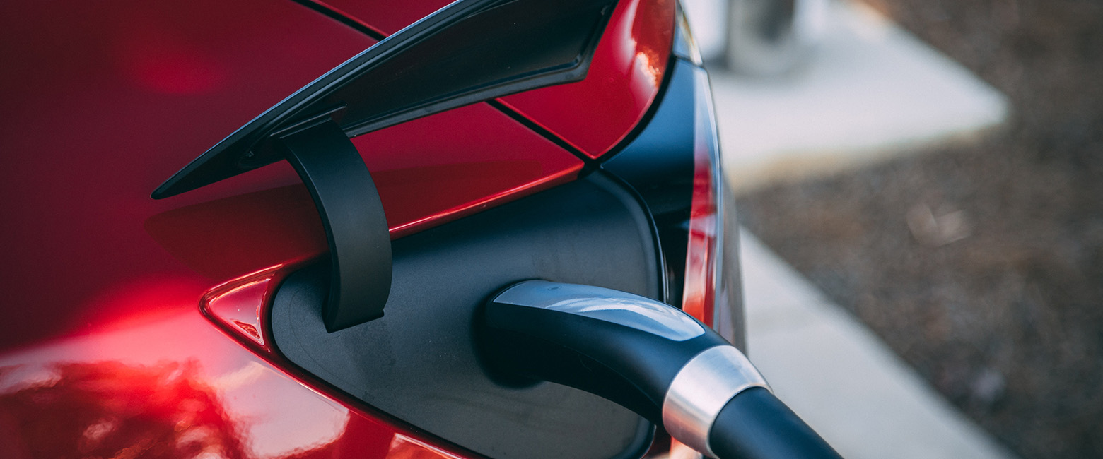 Electric vehicle being charged