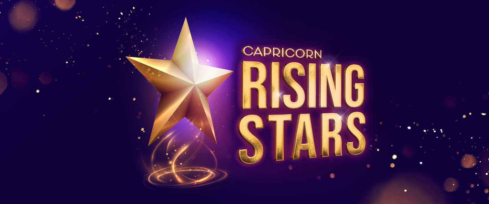 A golden star with a glowing effect on a dark blue background. The text 'CAPRICORN RISING STARS' is prominently displayed in large, golden letters next to the star.