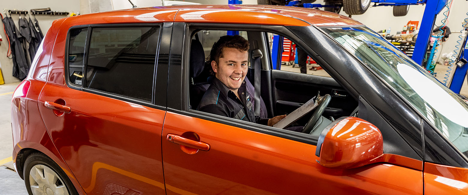 Technician in car