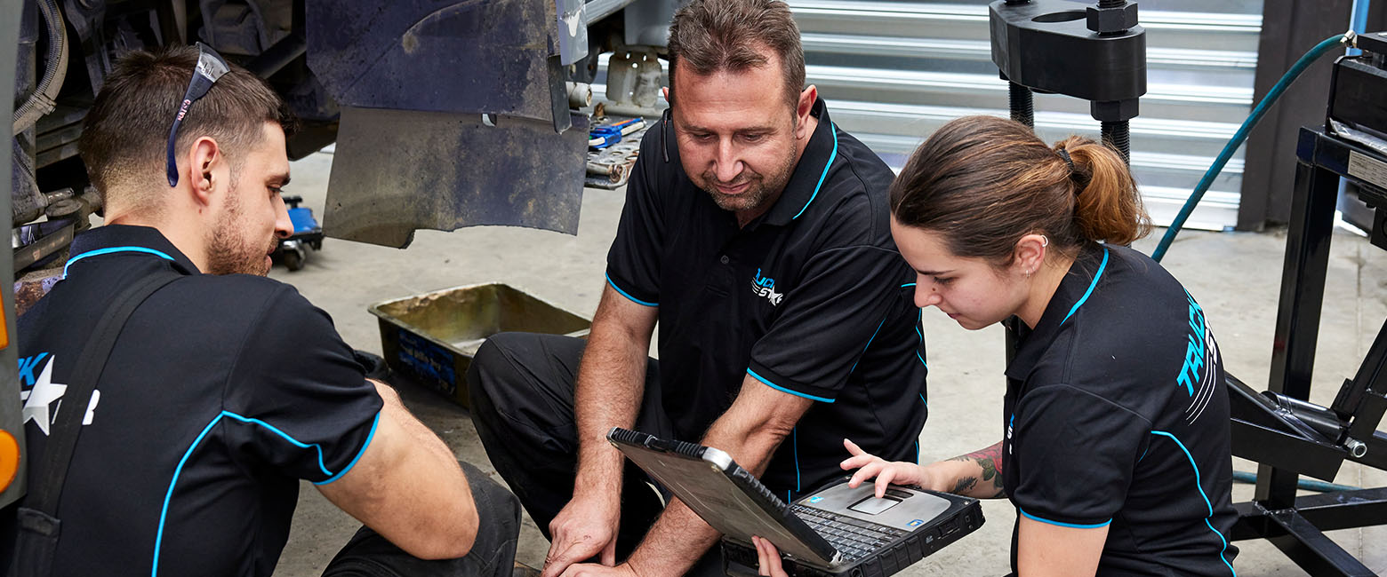 Mechanic and apprentices