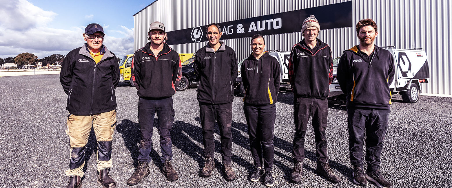 The All Ag & Auto team standing in front of their warehouse