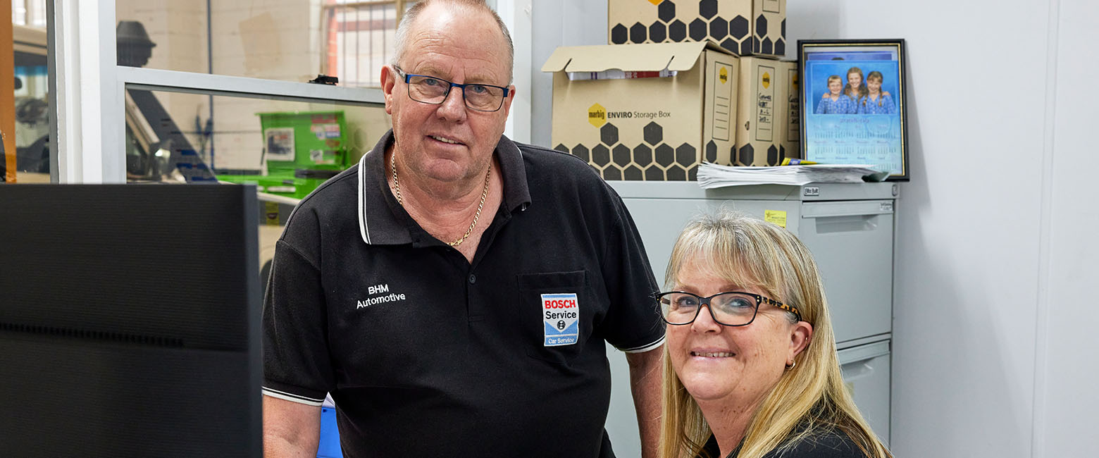 Man and woman at computer