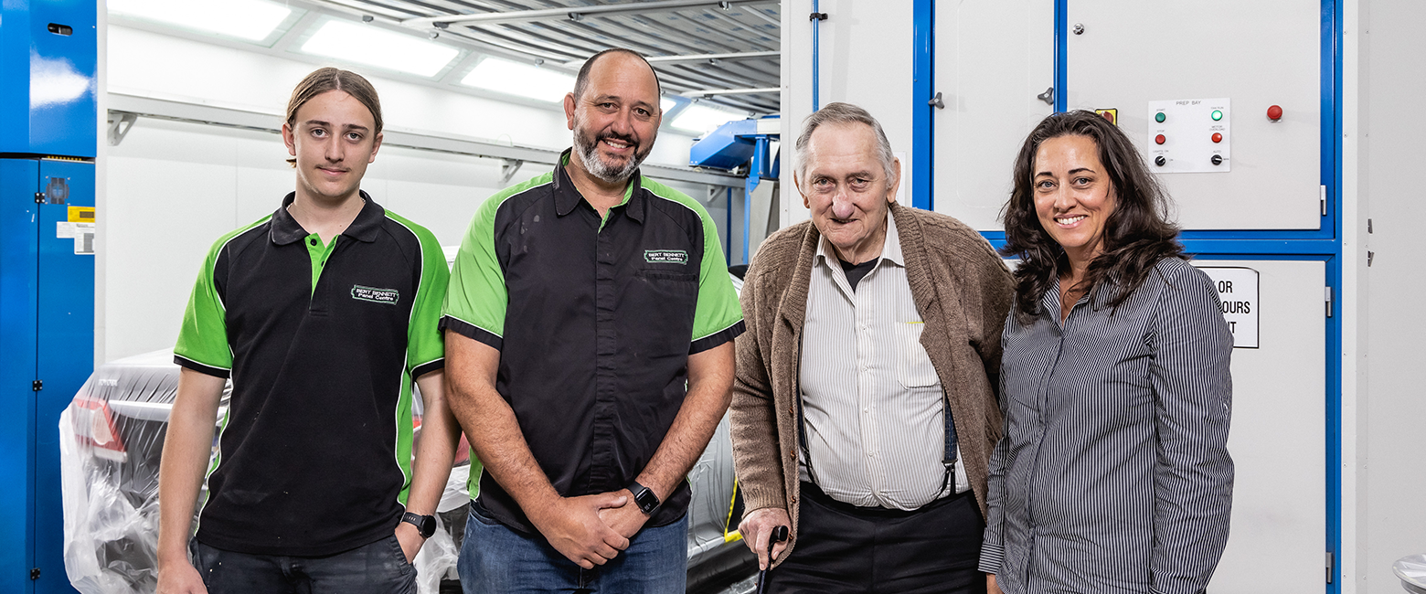 BJ, Bert, Bert (Snr) and Julie smiling to the camera