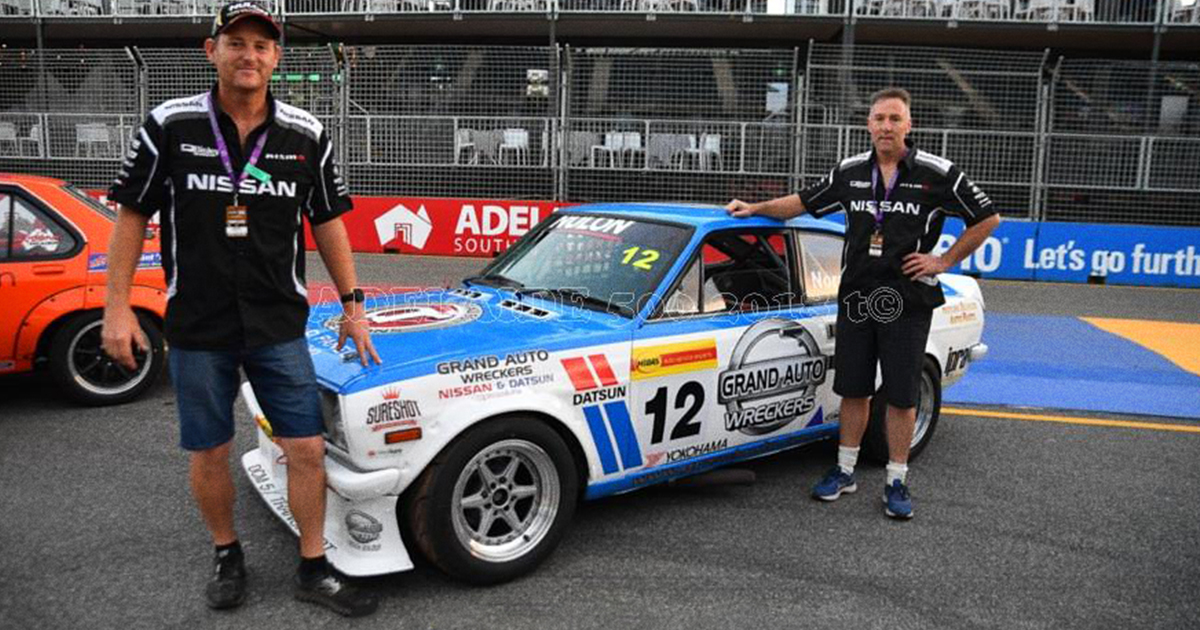 Capricorn Member, Anthony Norris  standing beside his Datsun 1200 