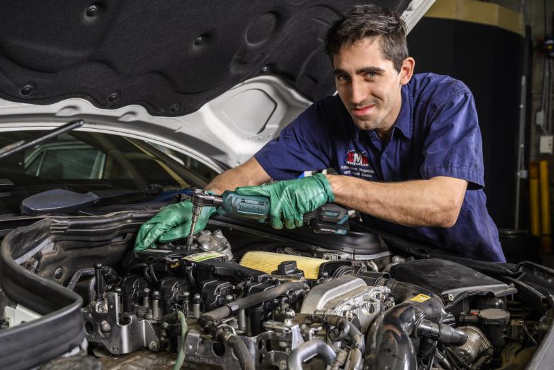 Man working on car