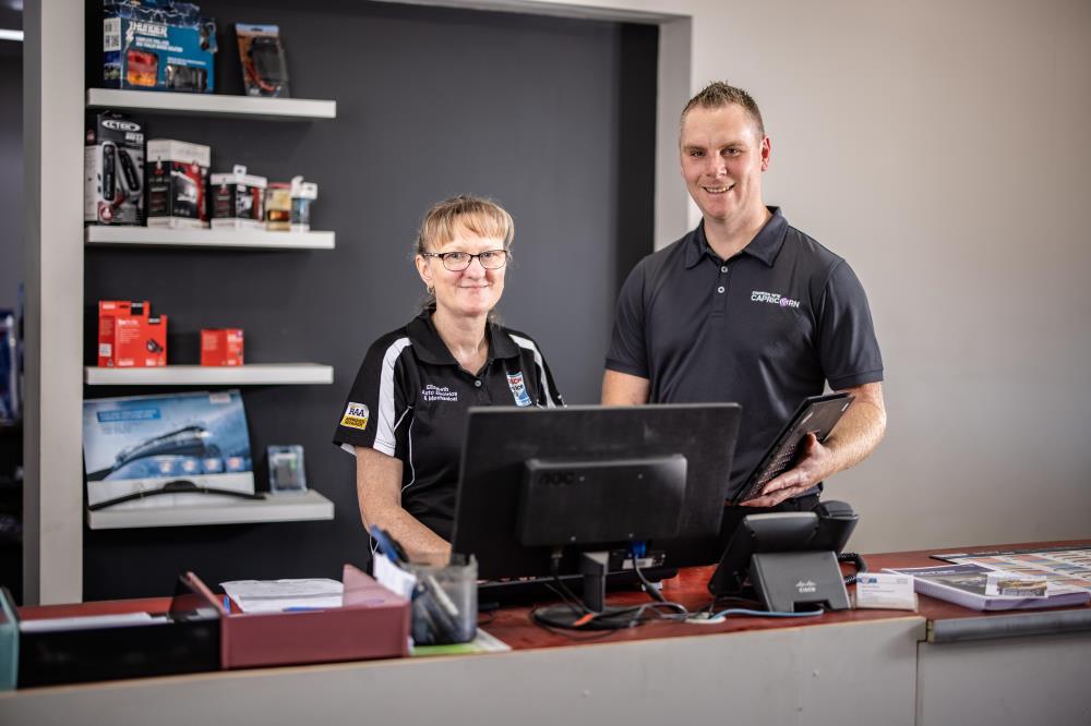 Man and woman at computer