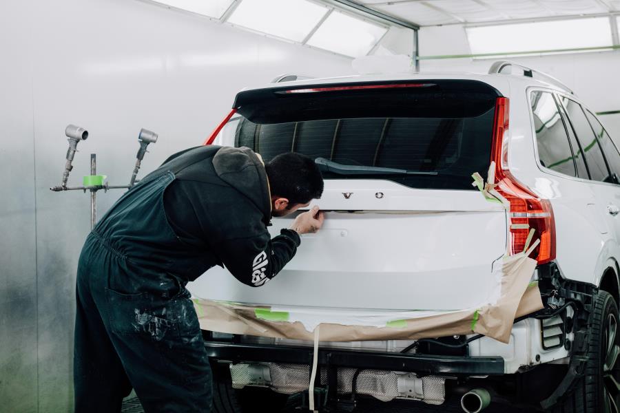 Person working on vehicle