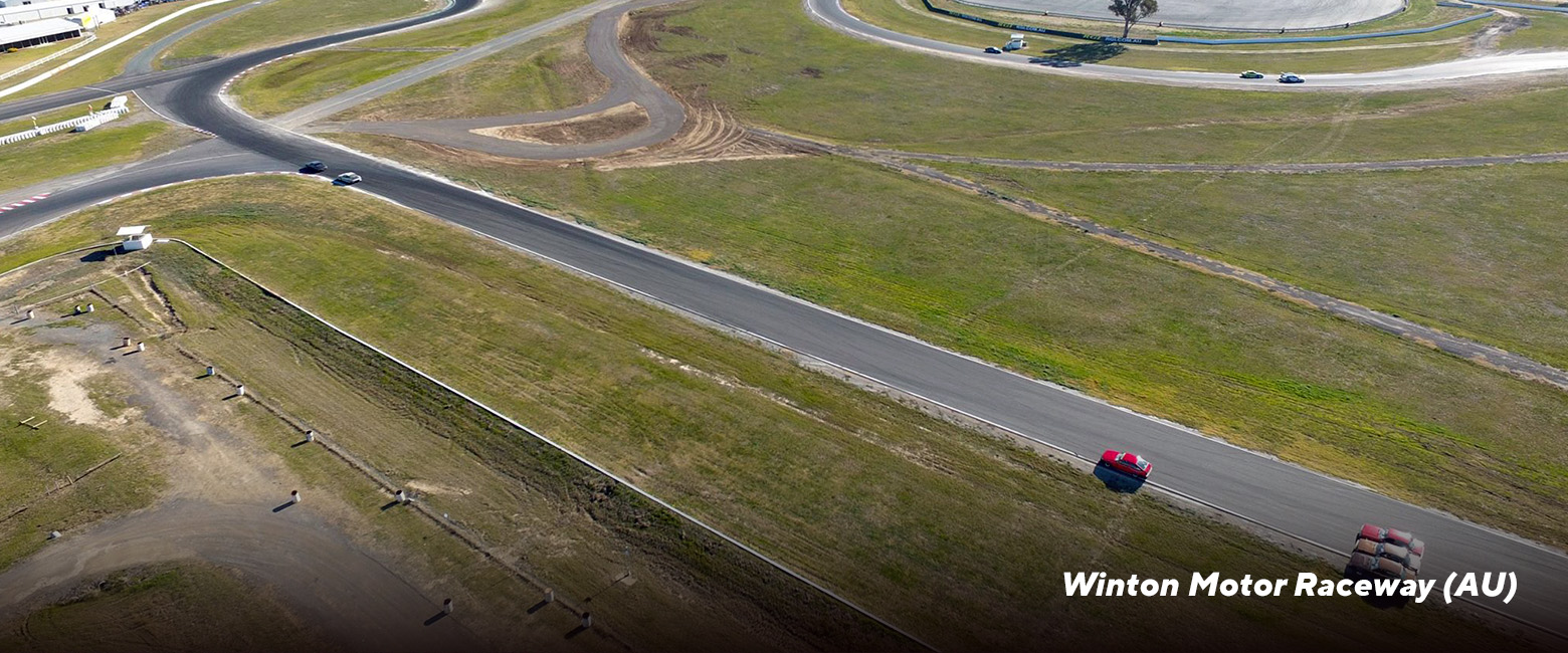 Aerial view of Winton Motor Raceway in Australia, showcasing thrilling car racing action.