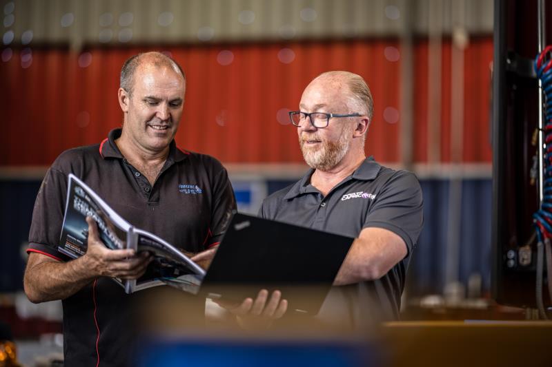 Two men in workshop