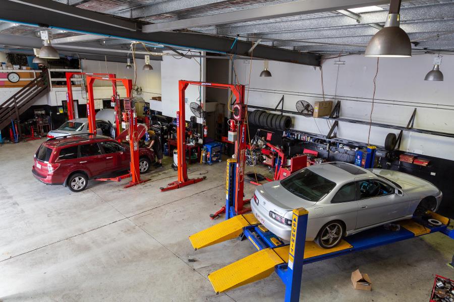 Cars in workshop