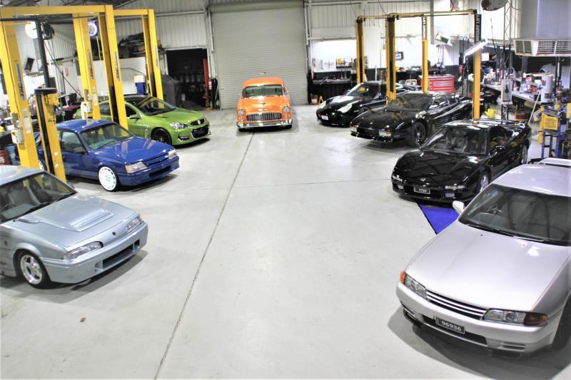 Group of cars in workshop