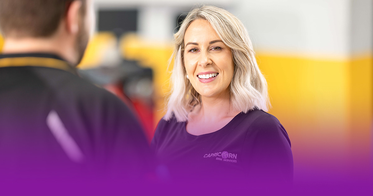 Capricorn team member smiling to the camera.